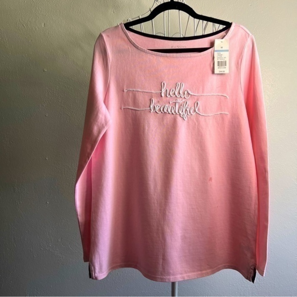Kim Rogers pink “hello beautiful” long-sleeved T-shirt.